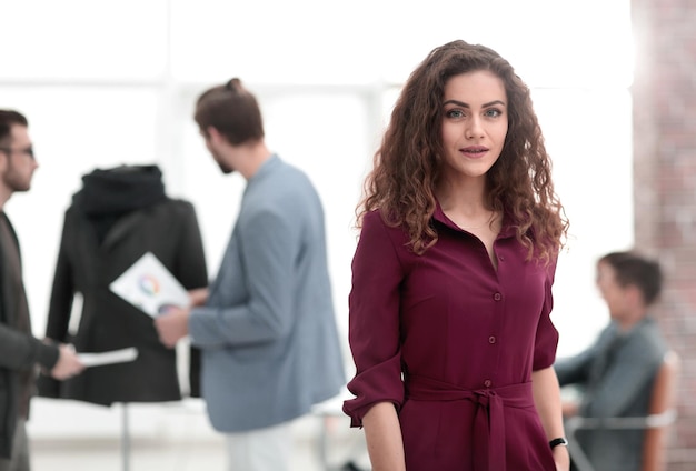 Fashion designer standing in a creative Studiop