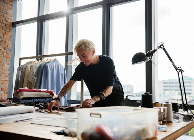 Photo fashion designer working in a studio