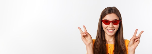 Fashion girl hipster in glasses white background isolated