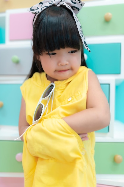 Fashion kids concept Portrait of asian girl pose for take a photo Thailand people