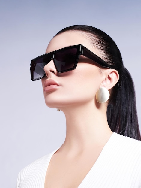 Fashion model in dark sunglasses