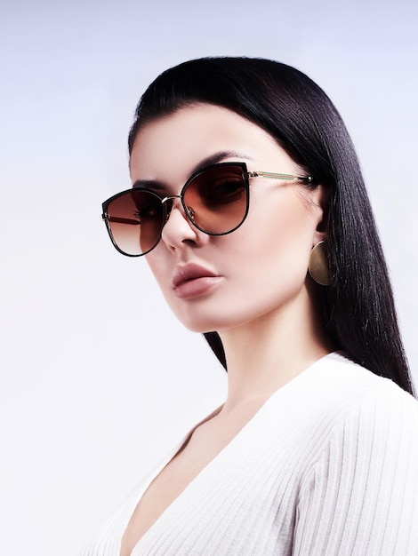 Fashion model in dark sunglasses