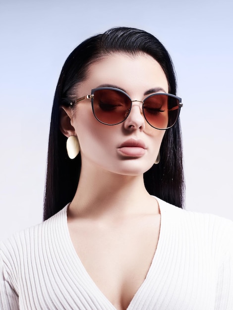 Fashion model in dark sunglasses