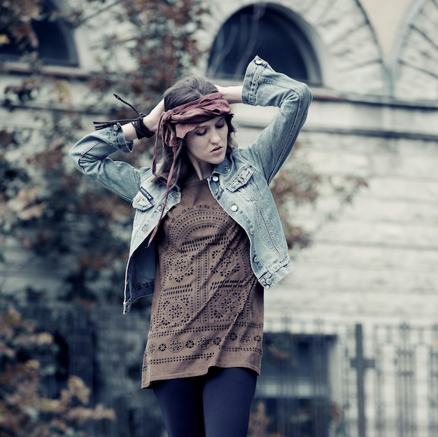 Fashion model posing in park