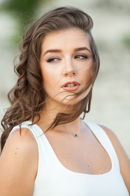 Fashion Portrait of Stylish Pretty Brunette Young Woman Outdoor