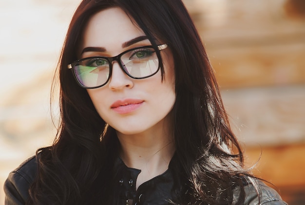 Fashion Portrait of Stylish Pretty Brunette Young Woman Outdoor