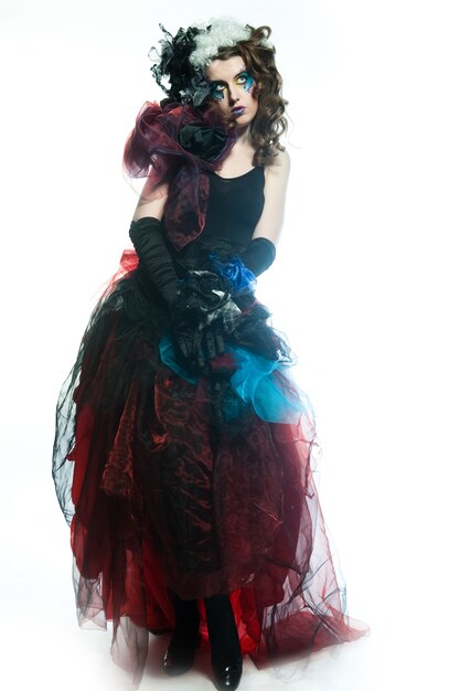 Fashion shot of woman in doll style. Creative make-up.Fantasy dress.