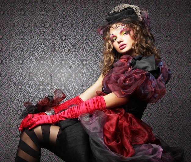 Fashion shot of woman in doll style Creative makeupFantasy dr