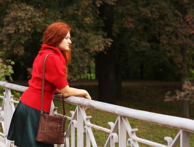 Fashion woman  in autumn park