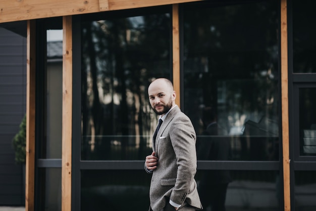 Fashionable european business man in perfect suite walk on the street