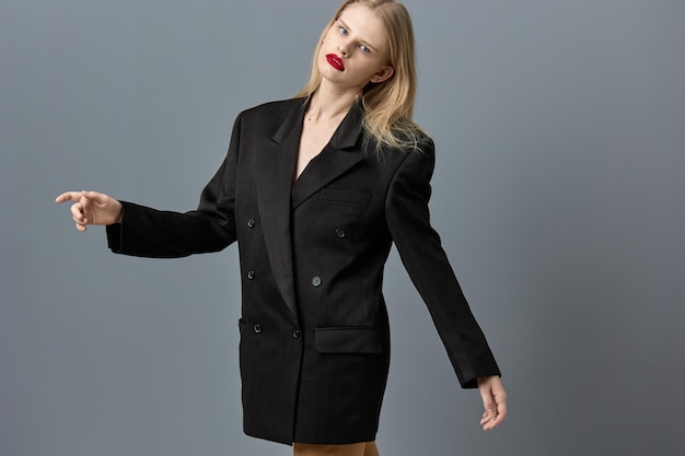 Fashionable woman stylish black blazer red lips studio model unaltered