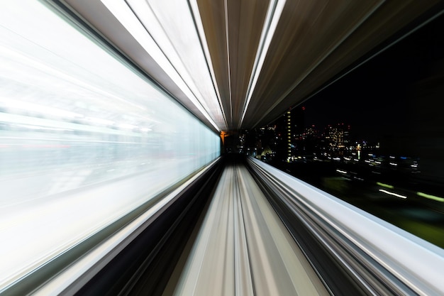 Fast train passing through city