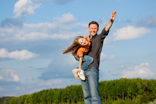 Father and child playing together