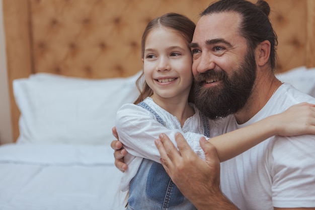 Father and daughter enjoying cozy day at home