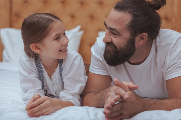 Father and daughter enjoying cozy day at home