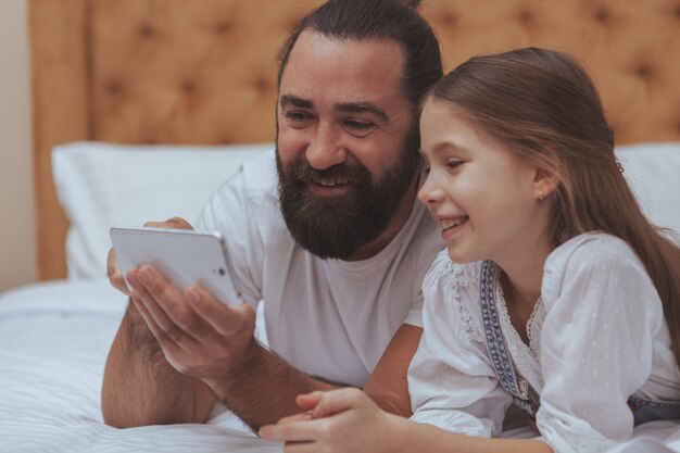 Father and daughter enjoying cozy day at home