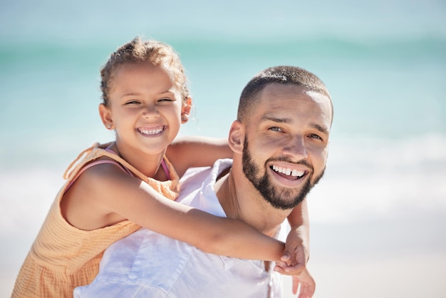 Father girl or bonding in fun beach game by Mexico ocean or sea for summer family holiday Portrait smile and happy man or parent carrying daughter kid or child playing in nature water environment