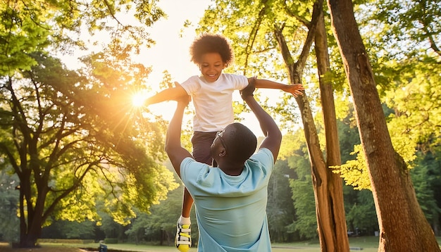 a father and his son playing in the park