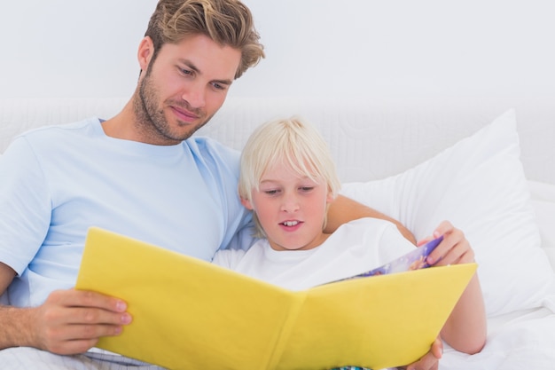 Father reading a story to his son