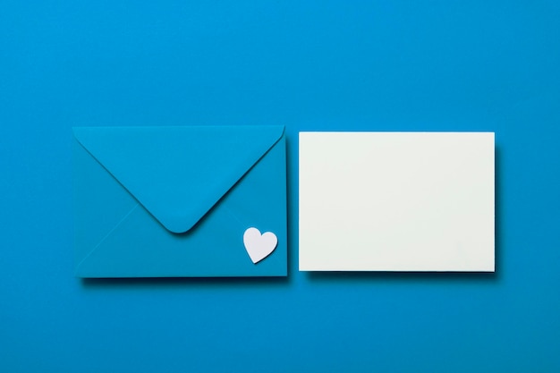 Father's Day card mockup Blue envelope blank white card and hearts