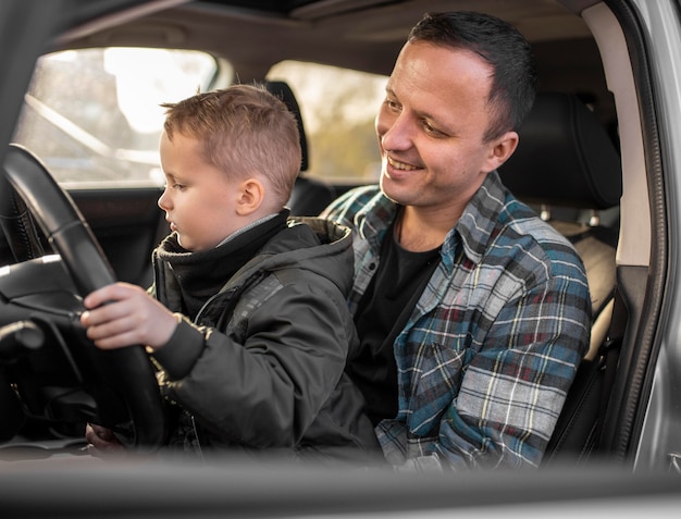 Father and son in the car