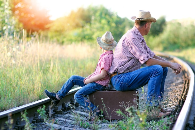 Father and son cowboys concept happiness together