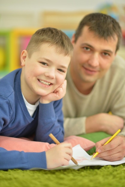 Father and son doing homework