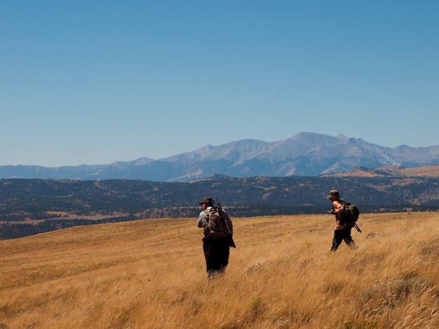 Father and son on hunting trip.