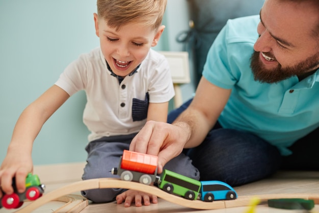 Father and son playing together