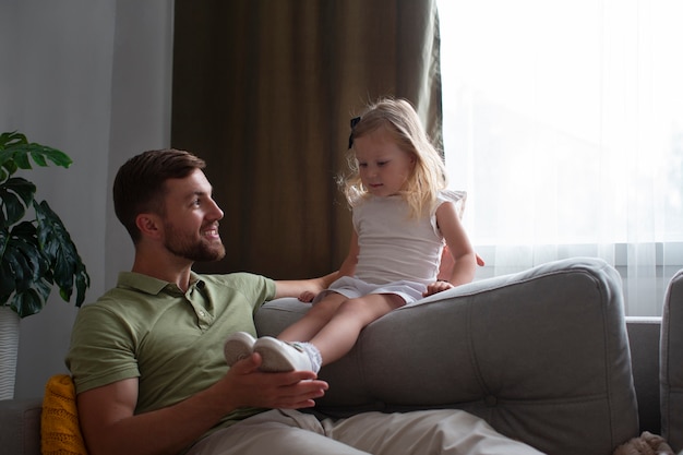 Father spending time with his adopted daughters