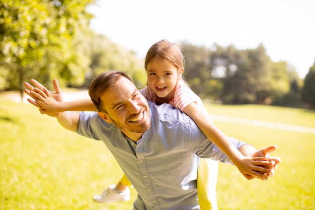 Father with daughter having fun at the park