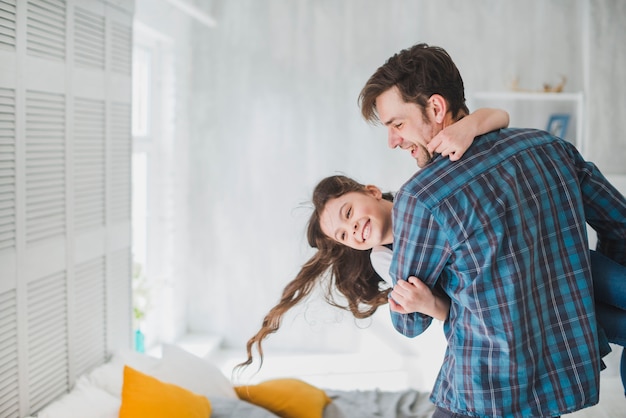 Fathers day concept with father and daughter having fun