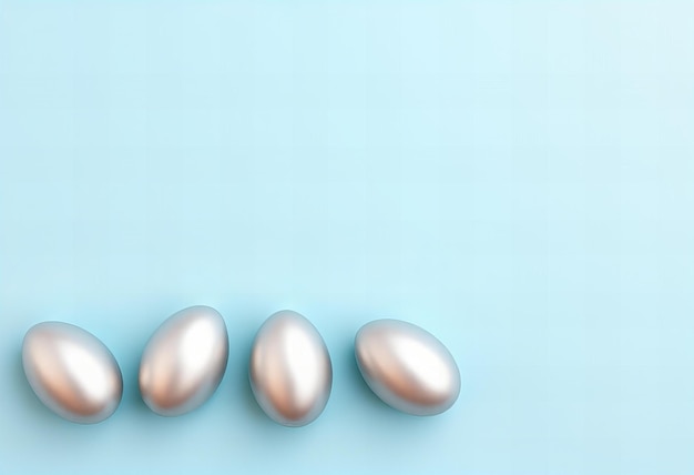 Photo featuring row of silver easter eggs on a pastel blue background in a minimalistic flat lay top vi