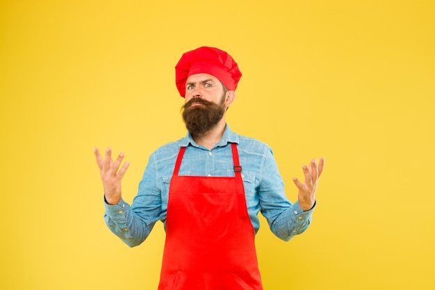 Feed your dreams restaurant cuisine and culinary catering business company welcome to our cafe time for lunch majestic bearded chef brutal male cook in hat and apron professional man cooking