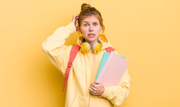 Feeling stressed anxious or scared with hands on head