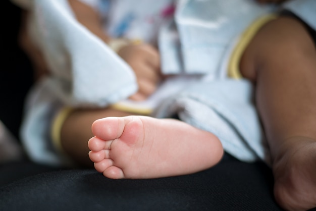 The feet of a newborn baby