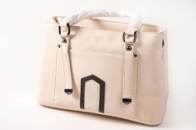 Female accessory leather bag on a white background.