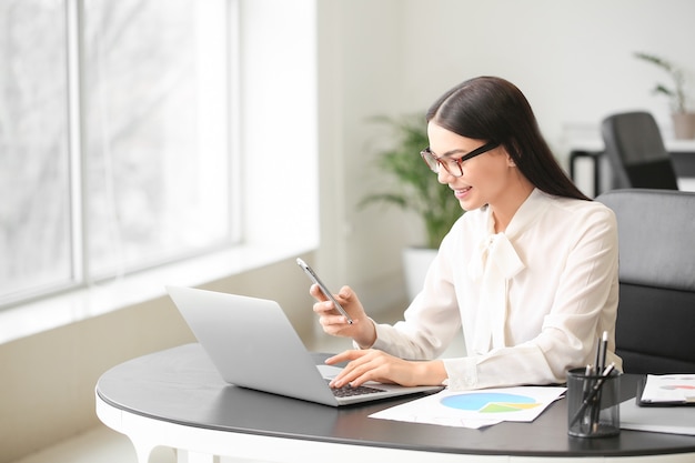 Female accountant working in office