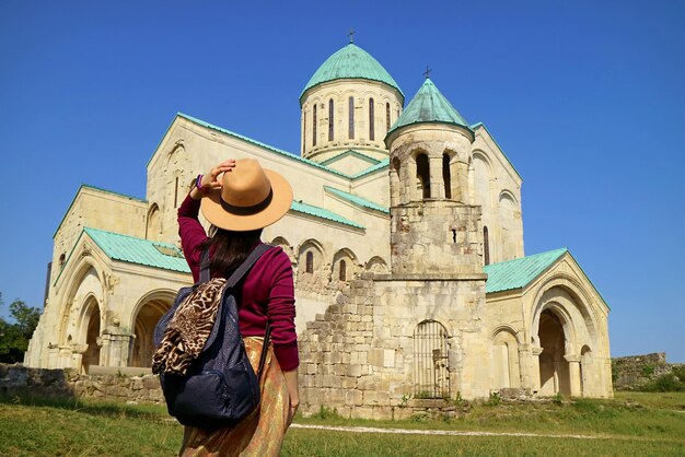 Female Being Impressed by Bagrati Cathedral  Medieval Church in Kutaisi City Imereti Region Georgia