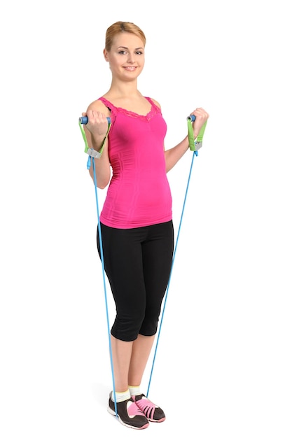 Female biceps exercise using rubber resistance band