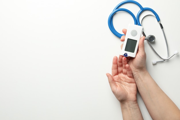 Female checking blood sugar level