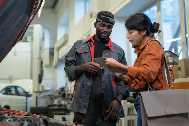 Female Client in Car Repair Shop