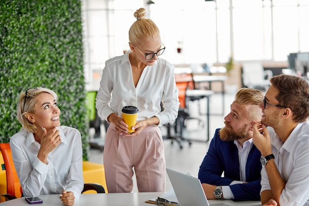 Female company director have nice talk with employees