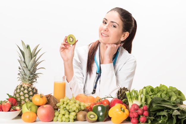 A female dietitian sits at her desk