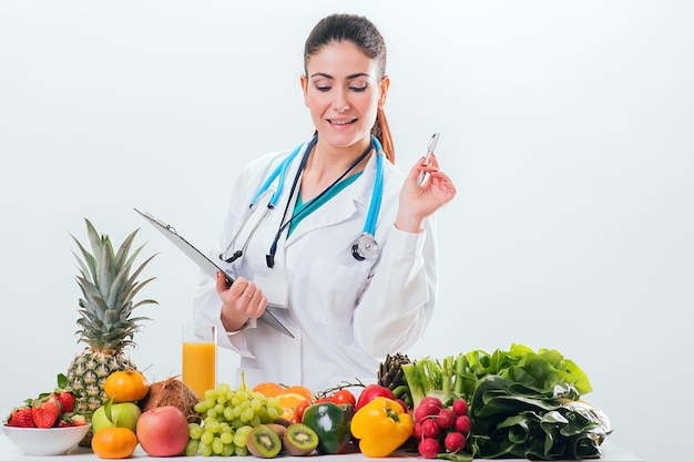 Female dietitian in uniform with stethoscope