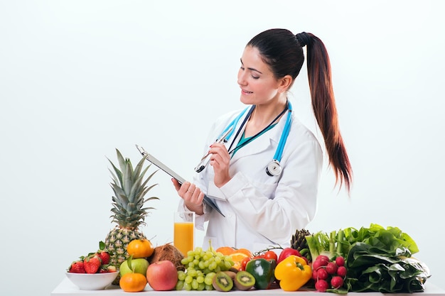 Female dietitian in uniform with stethoscope