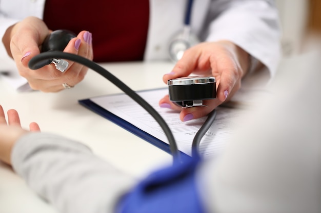 Female doctor arms make medic procedure closeup