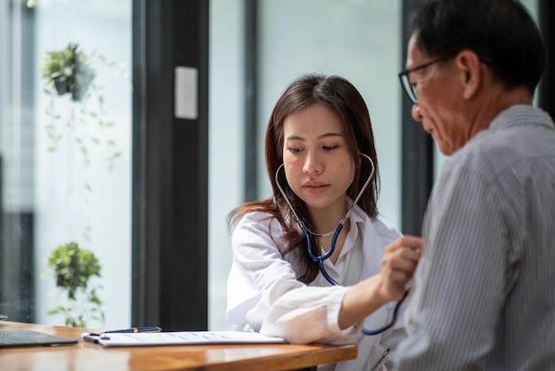 Female doctor examining patient at clinic