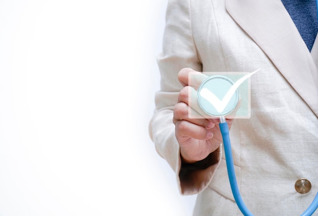 Female doctor holding a heart monitor checking health