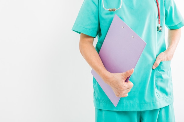 Female doctor, surgeon, nurse, pharmacy with stethoscope holding clipboard